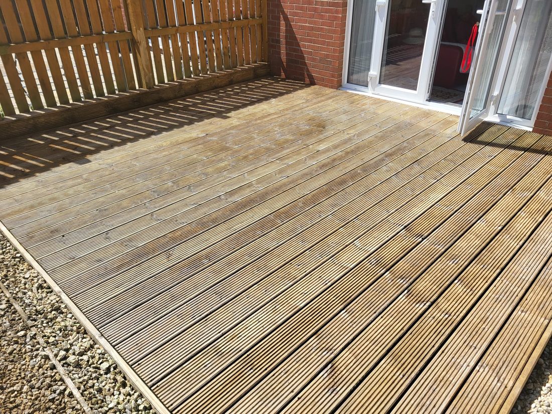 Timber decking after cleaning, restored and bright