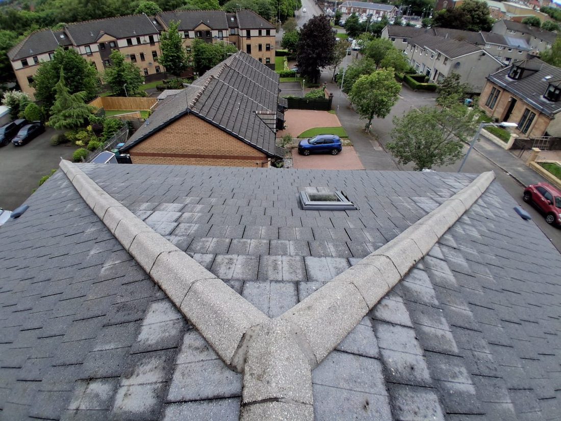 Valley roof after cleaning, slates clear of moss