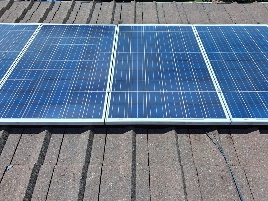 Solar panels and roof tiles after cleaning